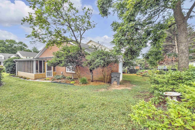 360 W Pointe Dr, Spartanburg, SC 29301 - view of grassy yard featuring a sunroom