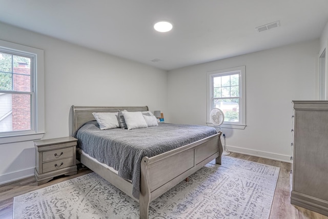 236 Heathwood Dr, Spartanburg, SC 29307 - bedroom featuring wood finished floors and baseboards
