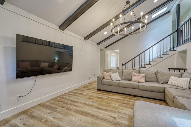 236 Heathwood Dr, Spartanburg, SC 29307 - living area featuring a chandelier, beam ceiling, stairway, wood finished floors, and high vaulted ceiling