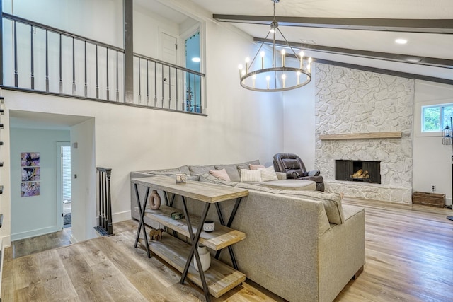 236 Heathwood Dr, Spartanburg, SC 29307 - living area featuring wood finished floors, a fireplace, and a chandelier