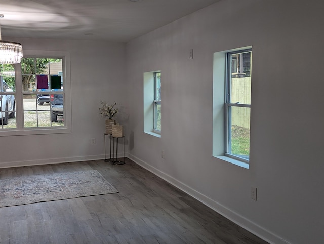 2115 Oakhurst Cir, Spartanburg, SC 29302 - empty room featuring wood finished floors and a chandelier