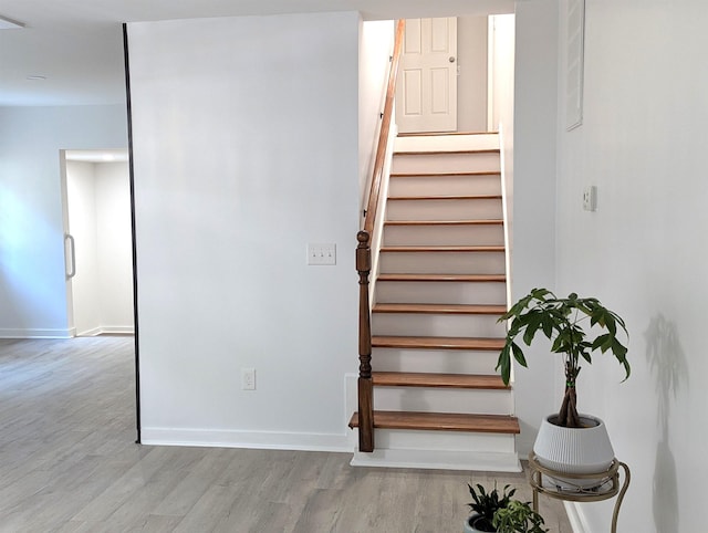2115 Oakhurst Cir, Spartanburg, SC 29302 - staircase featuring wood finished floors and baseboards