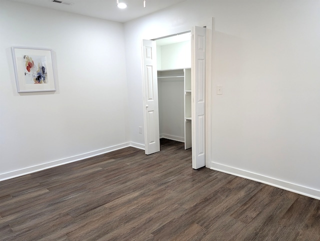 2115 Oakhurst Cir, Spartanburg, SC 29302 - unfurnished bedroom featuring dark wood-style floors and a closet