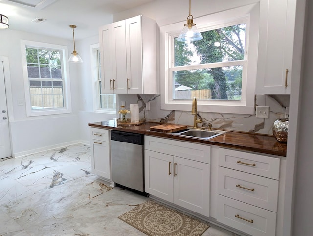 2115 Oakhurst Cir, Spartanburg, SC 29302 - kitchen featuring stainless steel dishwasher, wood counters, white cabinets, light marble finish floors, and pendant lighting