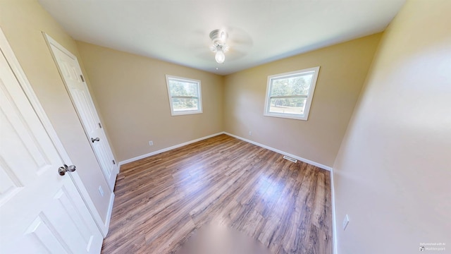 136 Sparkstown Dr, Enoree, SC 29335 - spare room featuring healthy amount of natural light, a ceiling fan, and wood finished floors