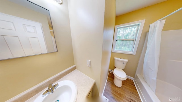 136 Sparkstown Dr, Enoree, SC 29335 - full bath featuring vanity, wood finished floors, and shower / bathtub combination with curtain