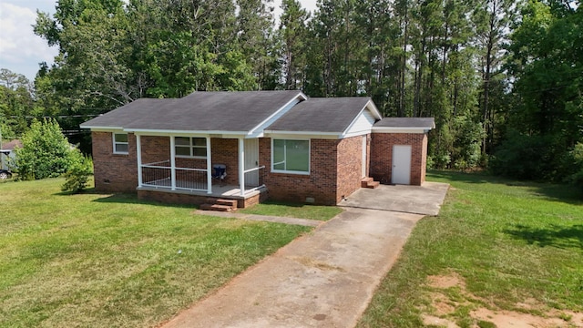 136 Sparkstown Dr, Enoree, SC 29335 - single story home with driveway, crawl space, brick siding, and a front lawn