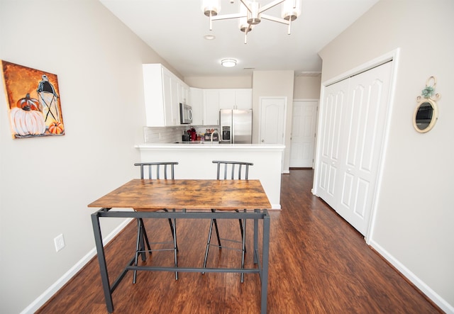 363 Robin Helton Dr, Boiling Springs, SC 29316 - dining area featuring dark wood-type flooring and a chandelier