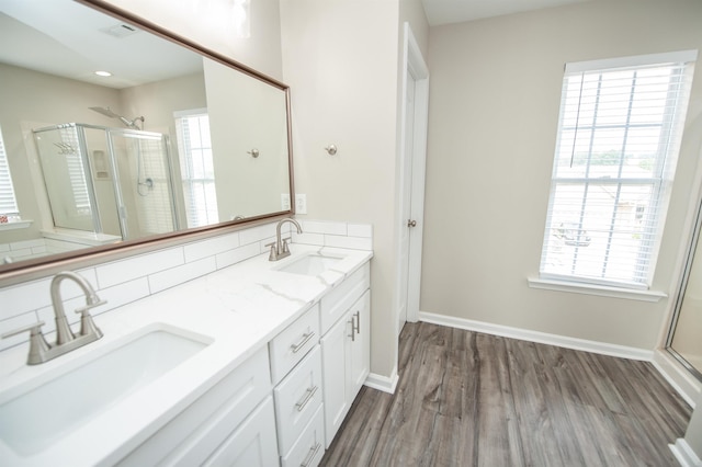 363 Robin Helton Dr, Boiling Springs, SC 29316 - bathroom featuring plenty of natural light, a shower stall, wood finished floors, and double vanity