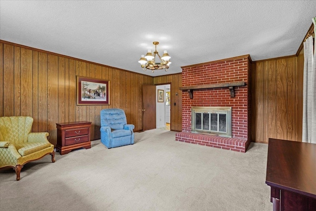 2160 Compton Bridge Rd, Inman, SC 29349 - living room featuring carpet flooring, a chandelier, wood walls, a fireplace, and ornamental molding