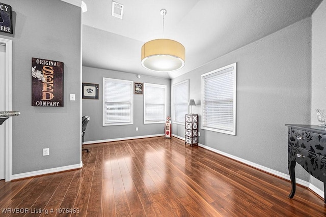 interior space with dark hardwood / wood-style flooring