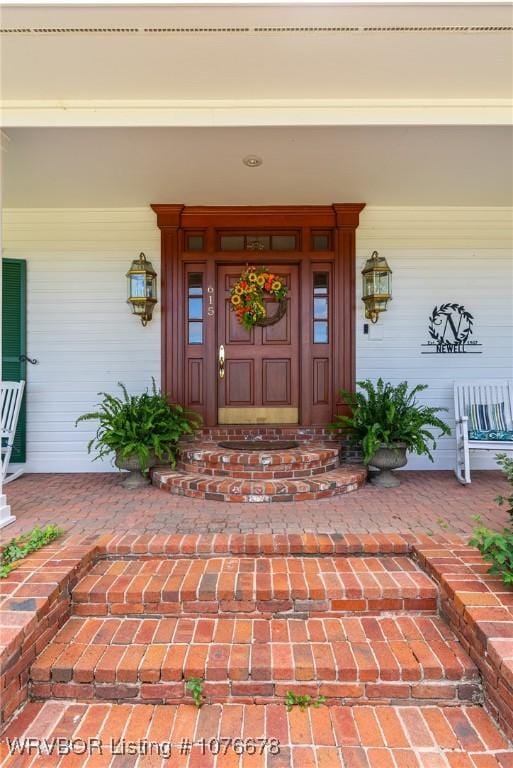 property entrance with a porch