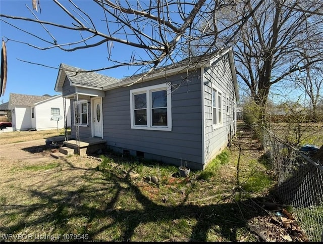 exterior space featuring a yard