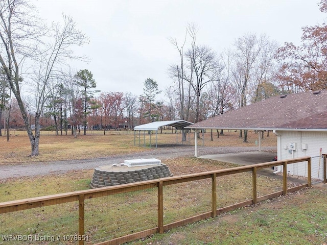 view of yard with a carport