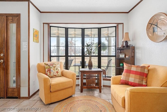 sitting room with crown molding and light tile patterned flooring