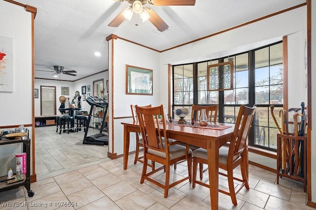 dining area with crown molding, a textured ceiling, and ceiling fan