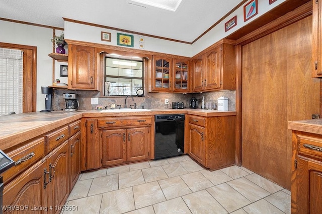 kitchen with sink, decorative backsplash, ornamental molding, and dishwasher