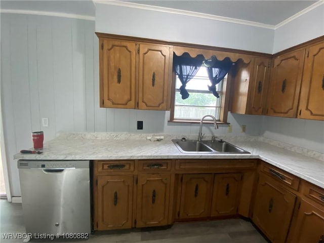 614 N School St, Charleston, AR 72933 - kitchen with stainless steel dishwasher, a sink, light countertops, ornamental molding, and brown cabinets