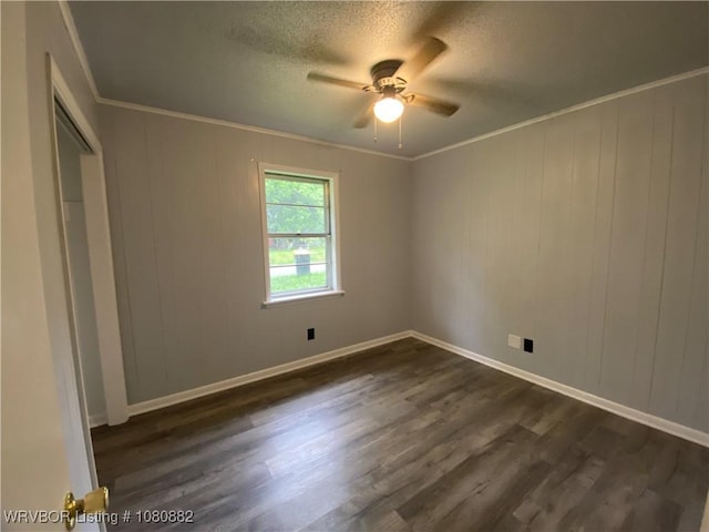 614 N School St, Charleston, AR 72933 - unfurnished room with ceiling fan, dark wood-style floors, a textured ceiling, baseboards, and crown molding
