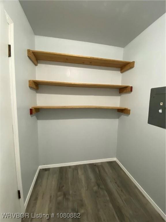 614 N School St, Charleston, AR 72933 - detailed view of baseboards and wood finished floors