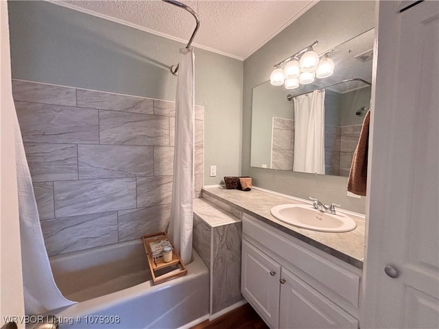 bathroom featuring a textured ceiling, shower / tub combo, visible vents, and vanity