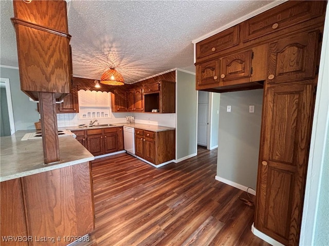 kitchen featuring crown molding, dark wood-type flooring, white dishwasher, and a textured ceiling