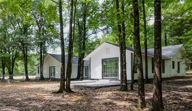 rear view of house featuring a patio