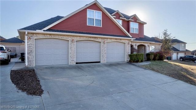 view of front of property featuring a garage