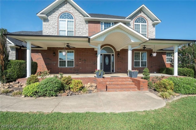 view of front of property with ceiling fan and covered porch