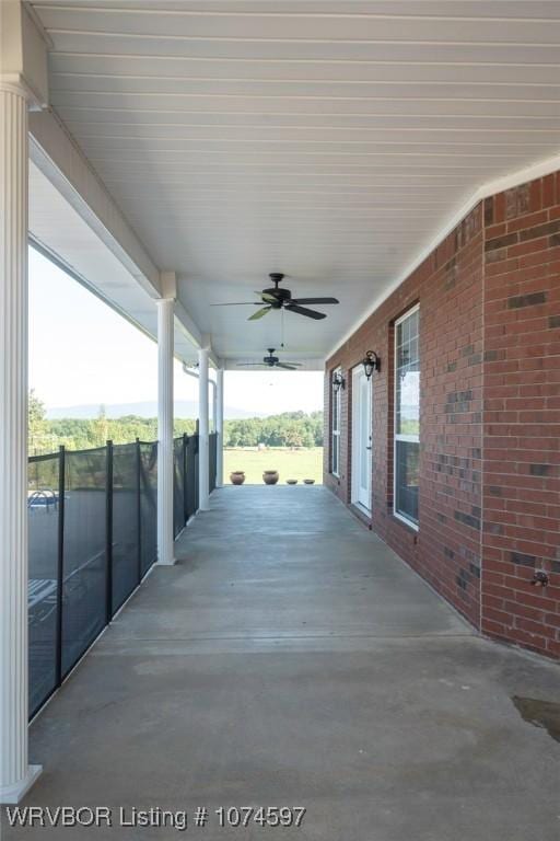 view of patio featuring ceiling fan