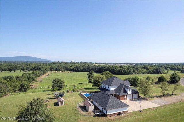 aerial view with a mountain view and a rural view