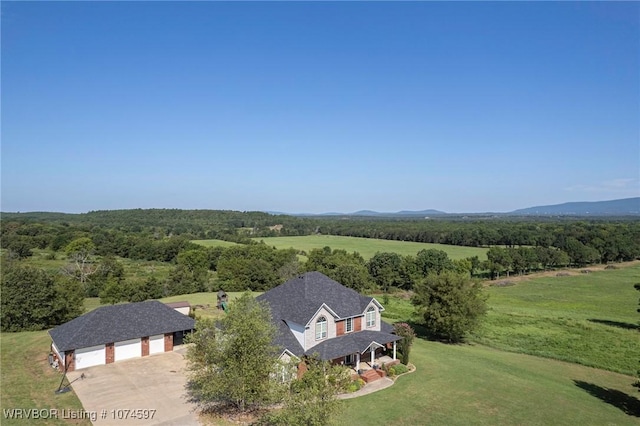 bird's eye view with a mountain view and a rural view