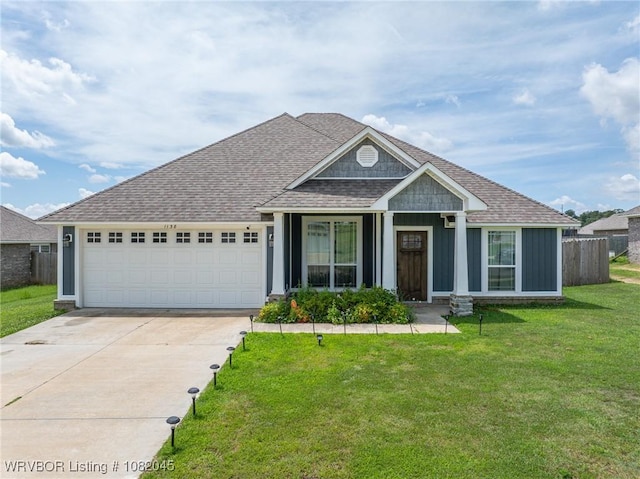 1138 Delta Dr, Van Buren, AR 72956 - view of front facade with roof with shingles, concrete driveway, a garage, and board and batten siding