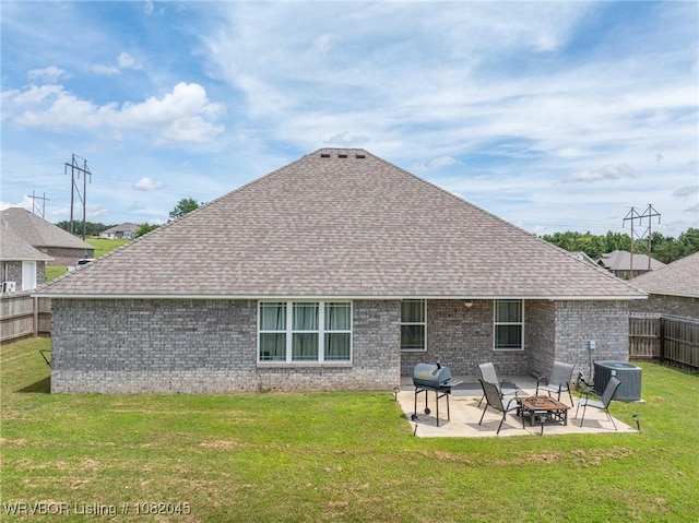 1138 Delta Dr, Van Buren, AR 72956 - rear view of property with brick siding, a patio, roof with shingles, and an outdoor fire pit