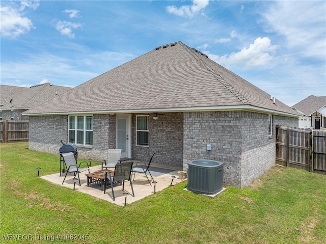 1138 Delta Dr, Van Buren, AR 72956 - back of house featuring brick siding, a fenced backyard, and a patio area