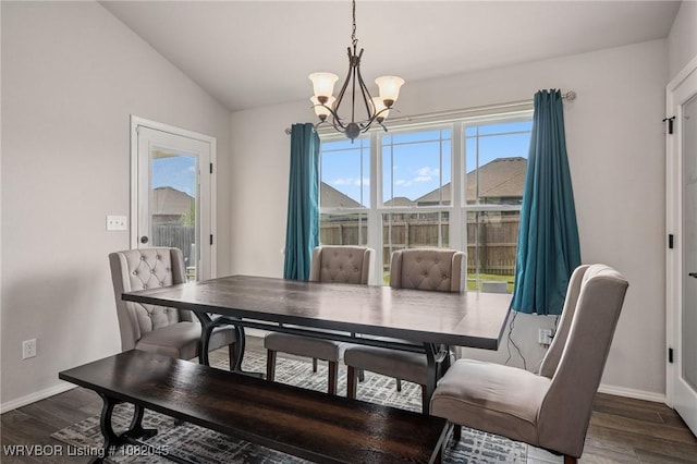 1138 Delta Dr, Van Buren, AR 72956 - dining space with a chandelier, plenty of natural light, wood finished floors, and lofted ceiling