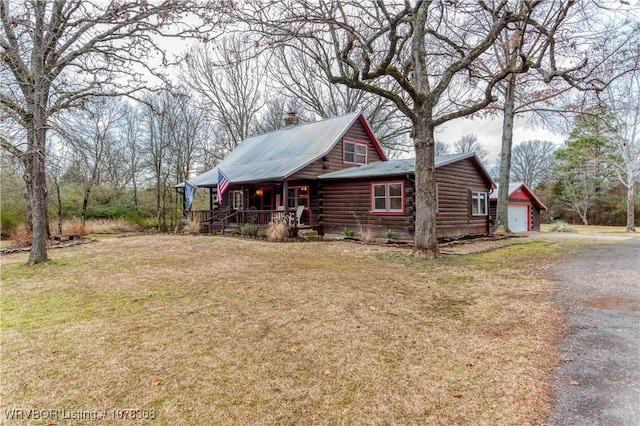 view of front of house featuring a front lawn and a porch