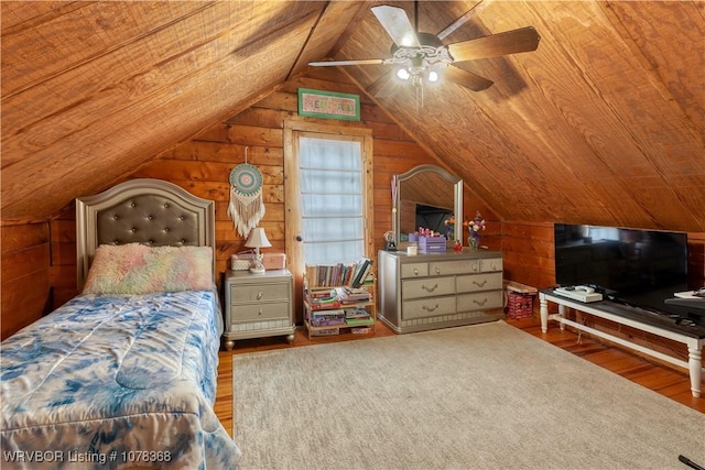 bedroom featuring ceiling fan, wooden ceiling, hardwood / wood-style flooring, and vaulted ceiling