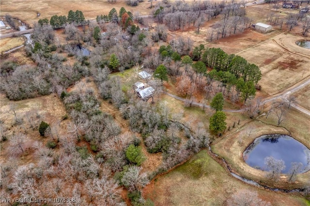 aerial view featuring a rural view and a water view