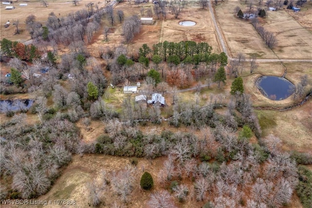 birds eye view of property with a rural view