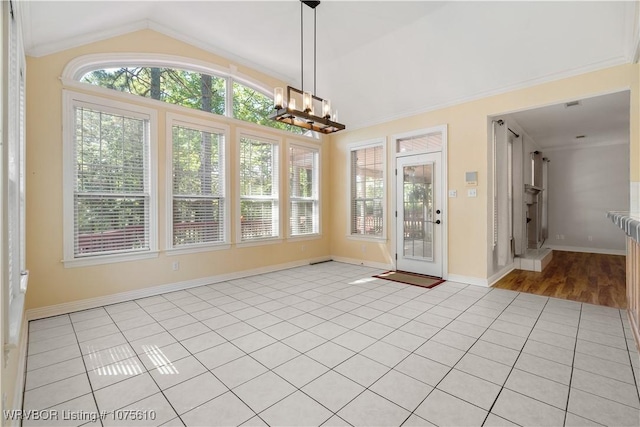 unfurnished sunroom with a notable chandelier and lofted ceiling