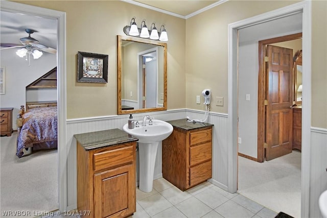 bathroom featuring crown molding, tile patterned floors, and ceiling fan