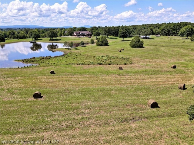 aerial view featuring a water view and a rural view