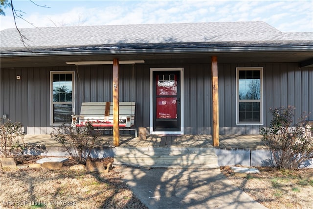 entrance to property with covered porch