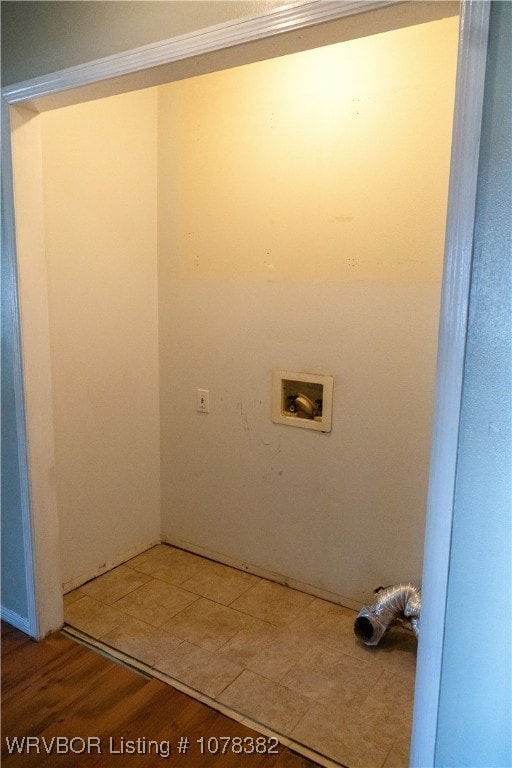 clothes washing area featuring washer hookup and wood-type flooring