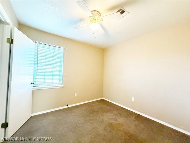 unfurnished room with carpet flooring and ceiling fan