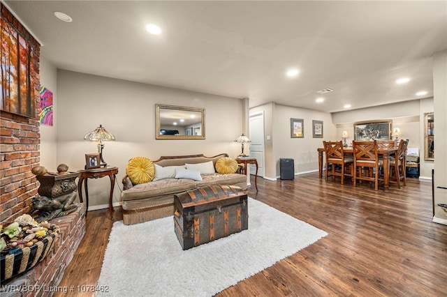 living room with dark wood-type flooring