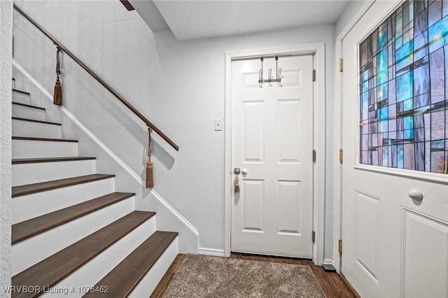 entryway featuring dark hardwood / wood-style floors