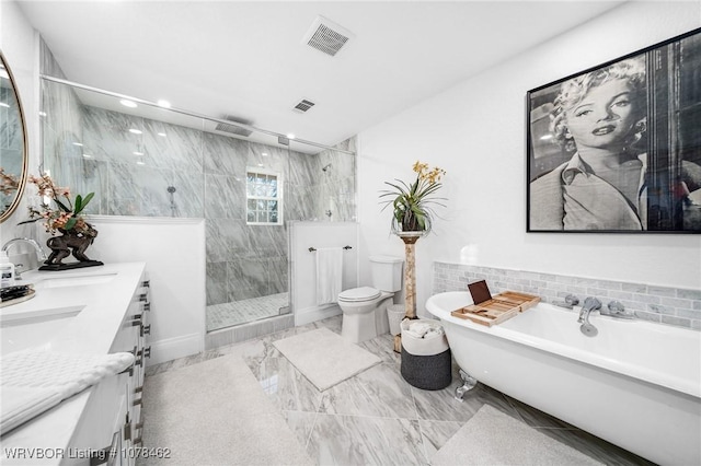 full bathroom featuring separate shower and tub, toilet, and vanity