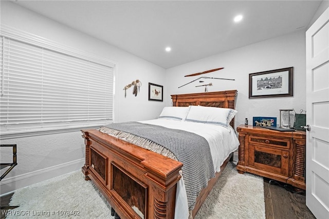 bedroom featuring wood-type flooring